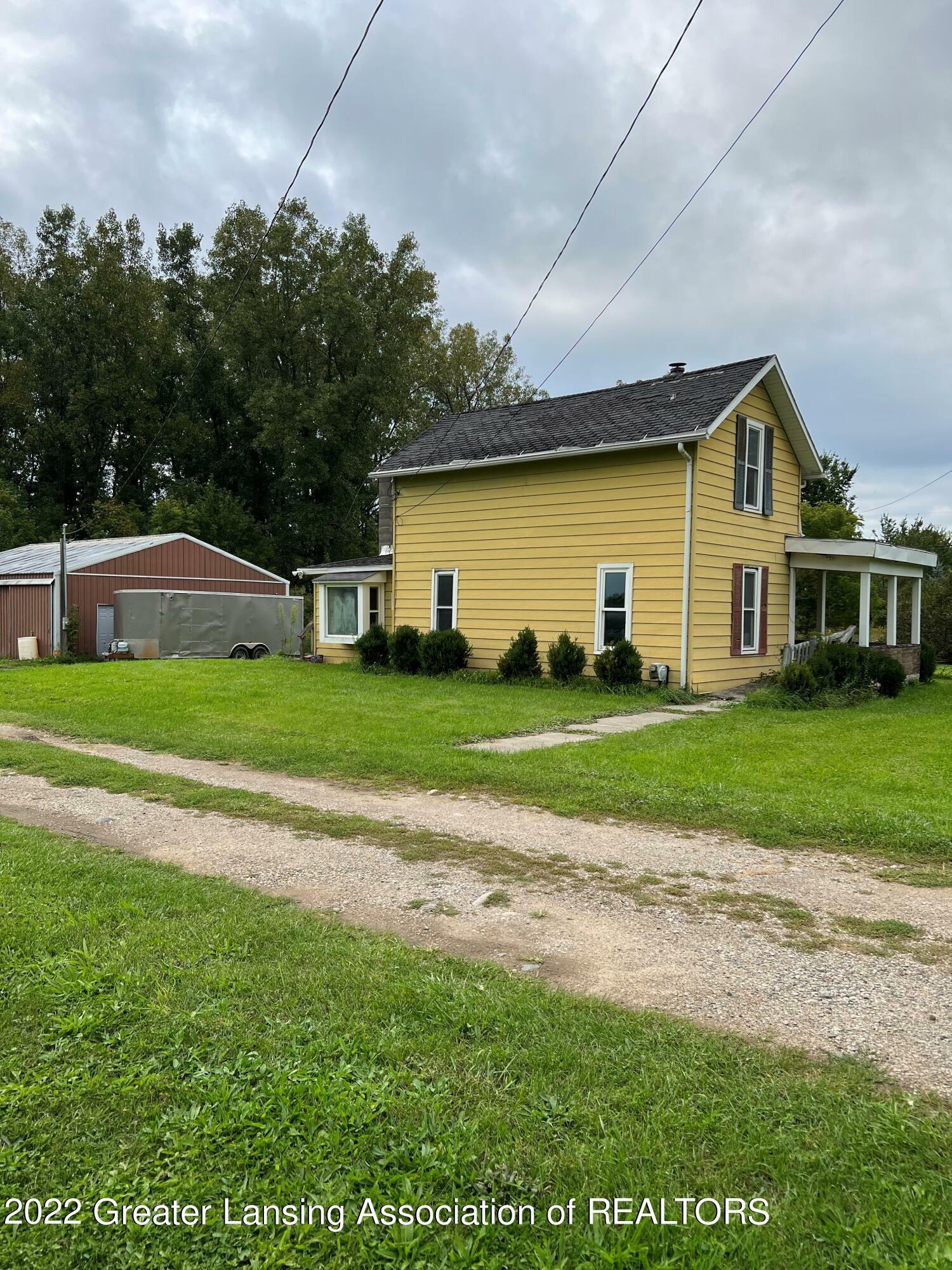 Property Photo:  10711 N Hartel Road  MI 48837 