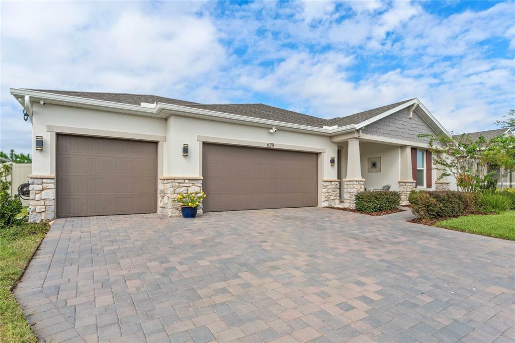 Property Photo:  679 Blue Citrus Lane  FL 34715 