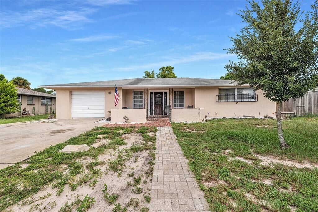 Property Photo:  7611 Lotus Drive  FL 34668 