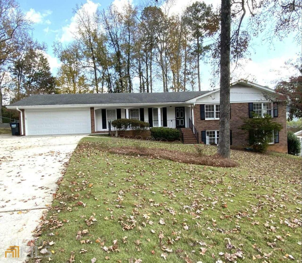 Property Photo:  5616 Nottingham Drive NW  GA 30047 