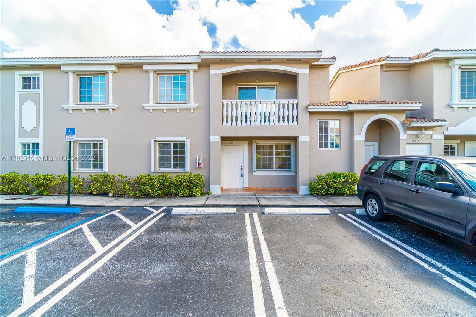 Property Photo:  7201 NW 174th Ter 103  FL 33015 