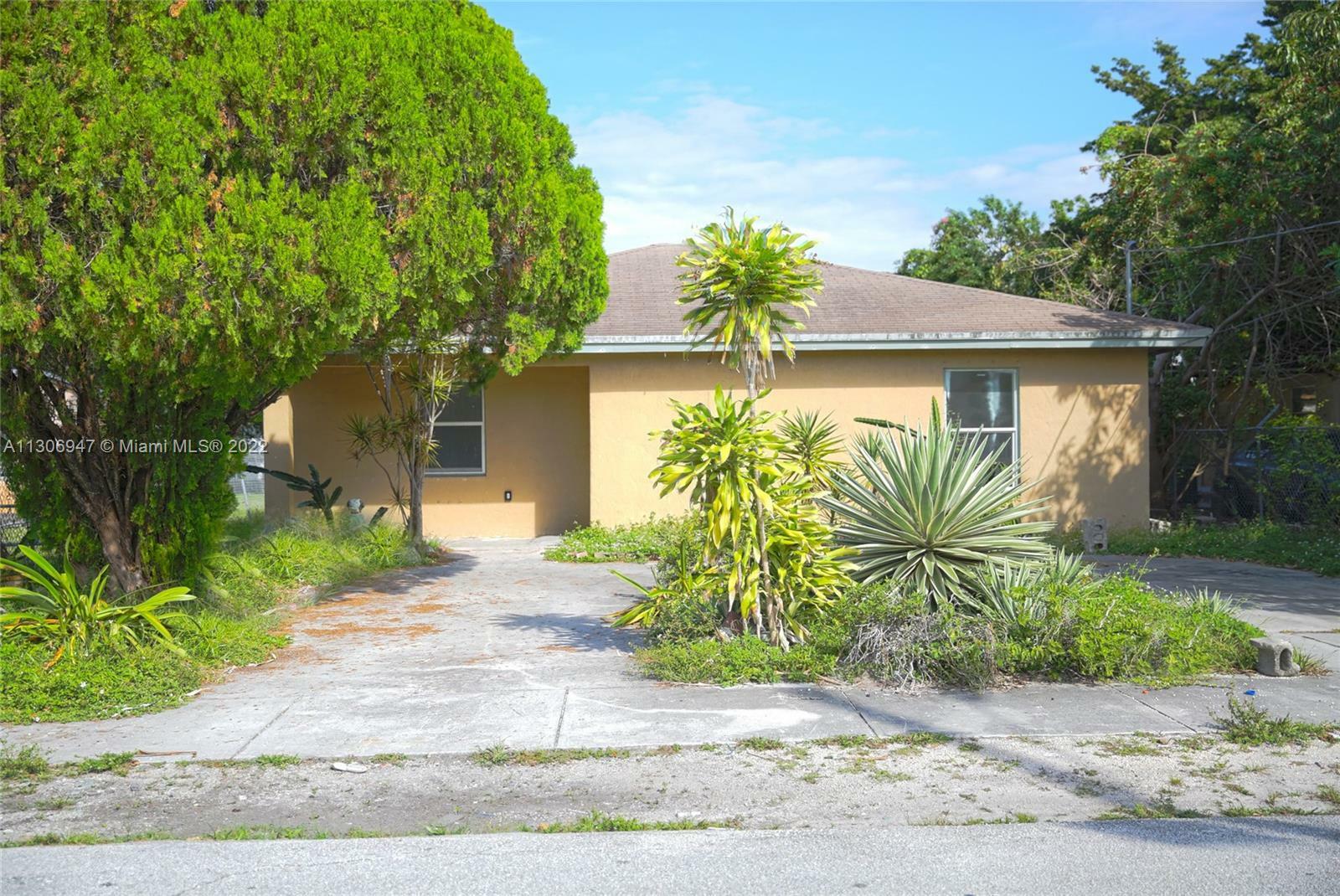 Property Photo:  2363 NW 63rd St  FL 33147 