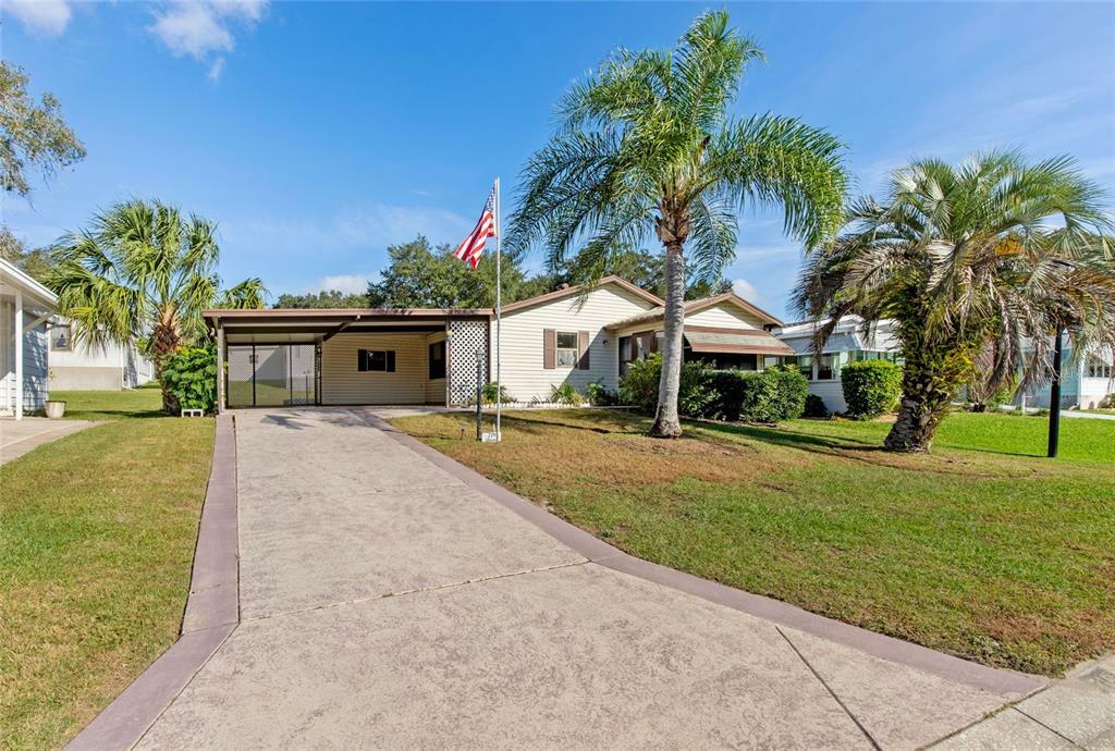 Property Photo:  719 Orchid Street  FL 32159 