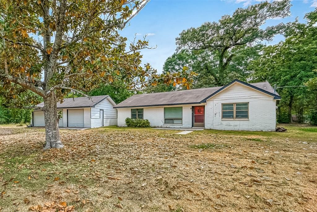 Property Photo:  29715 Nichols Sawmill Road  TX 77355 