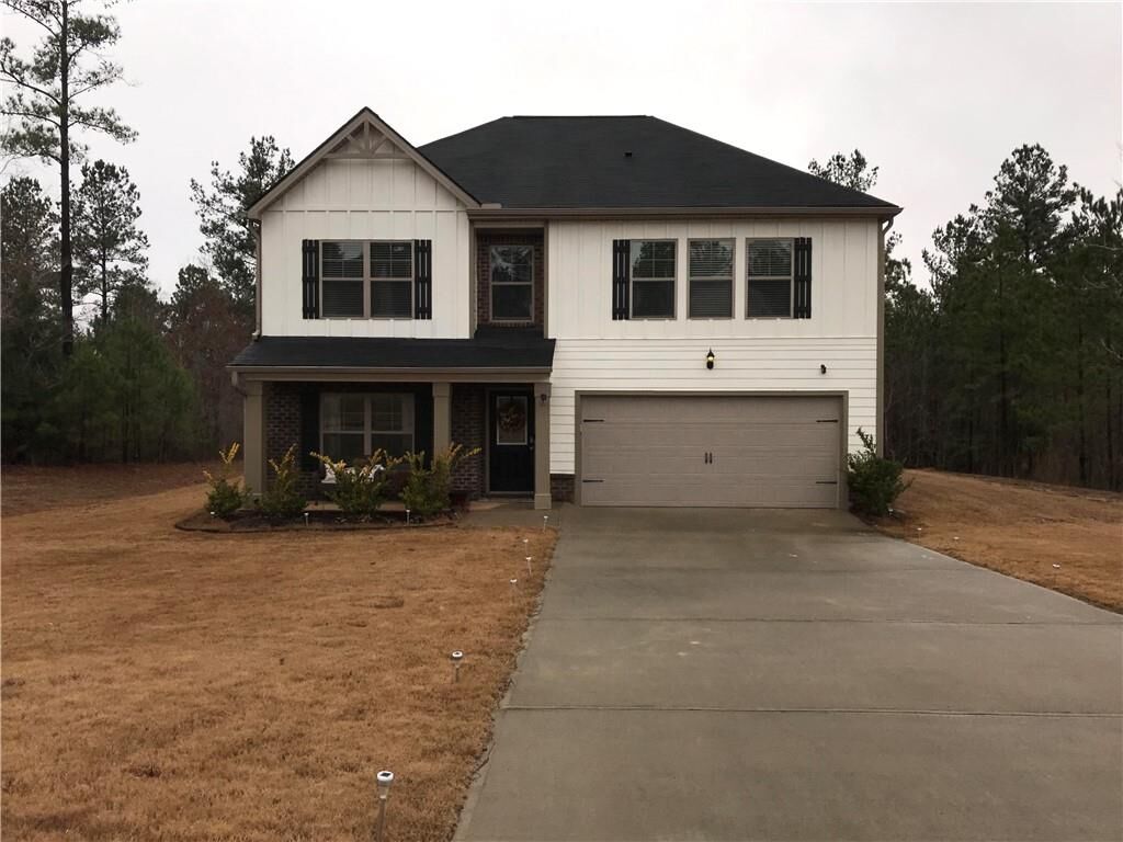 Property Photo:  206 Woodlands Drive  GA 30233 