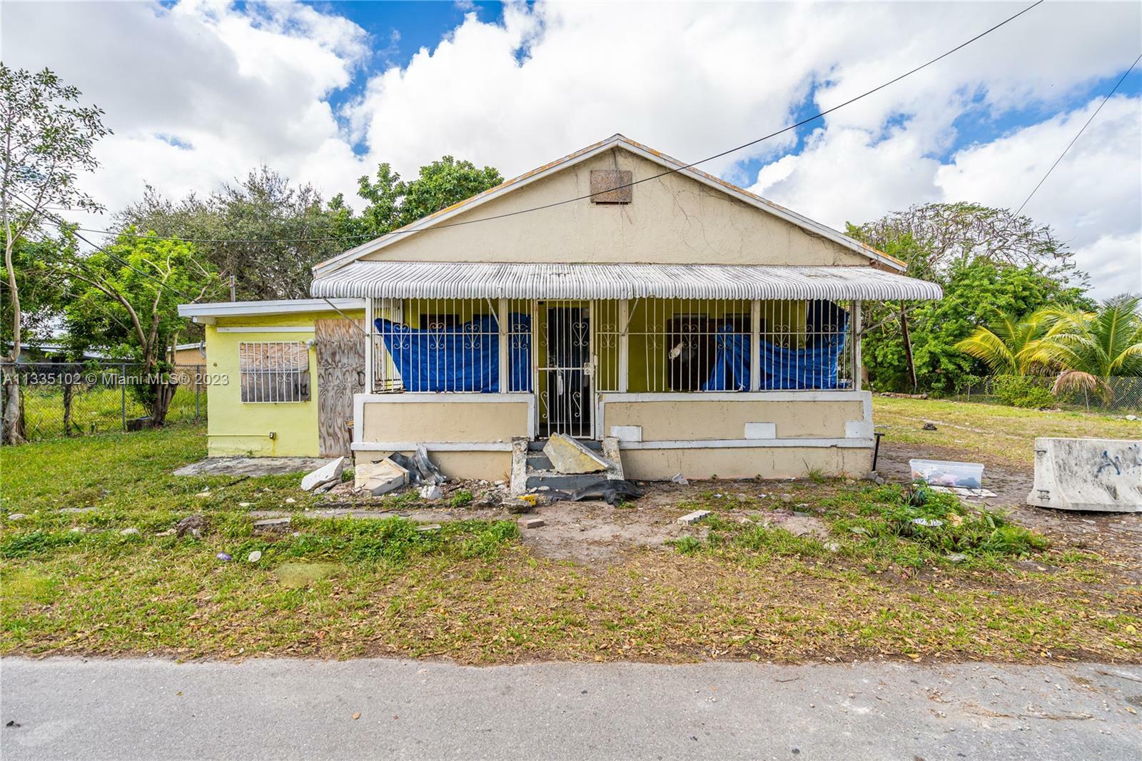 Property Photo:  6318 NW 19th Ct  FL 33147 