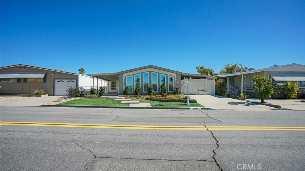 Property Photo:  26142 Queen Palm Drive  CA 92548 