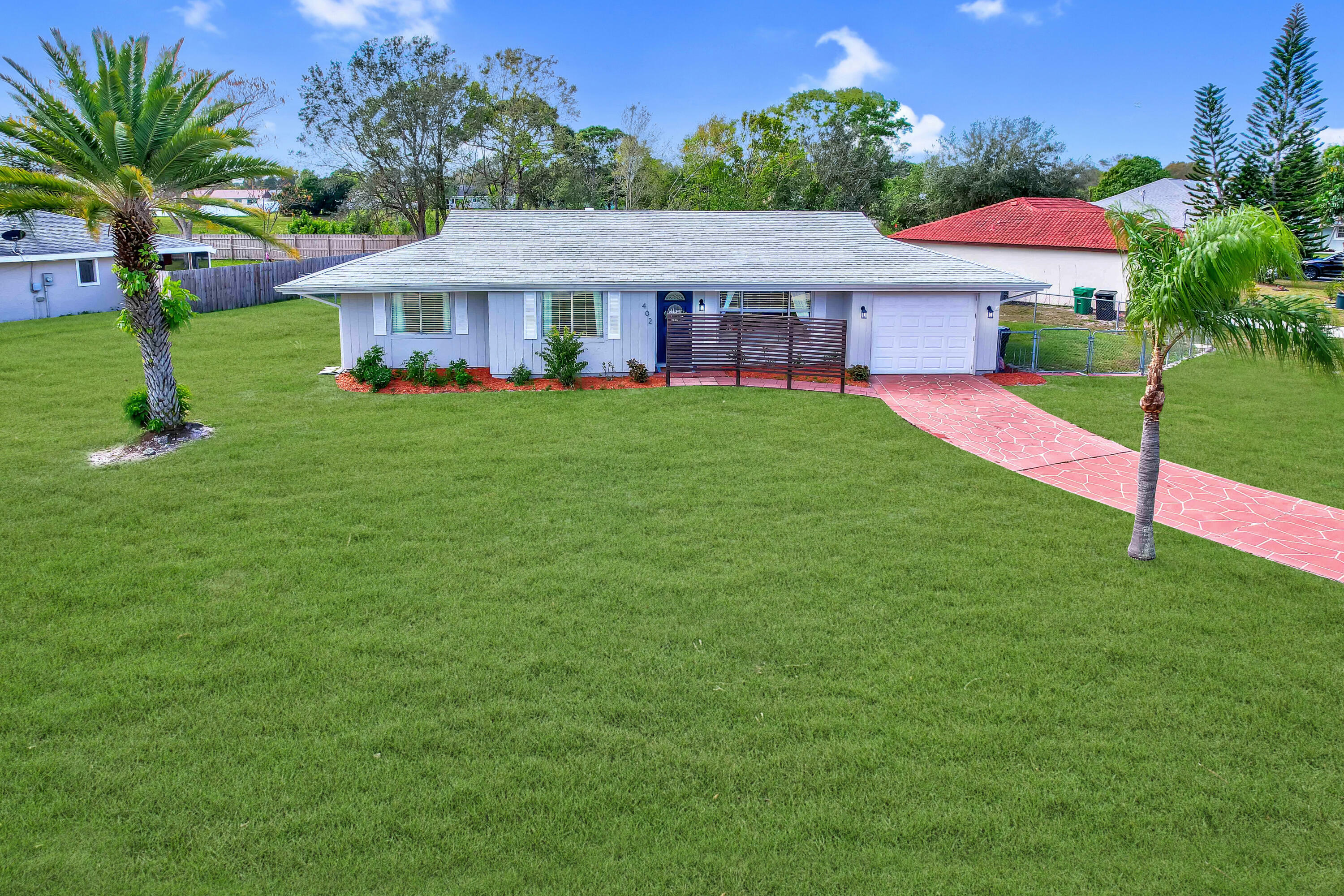 Property Photo:  402 SW College Park Road  FL 34953 