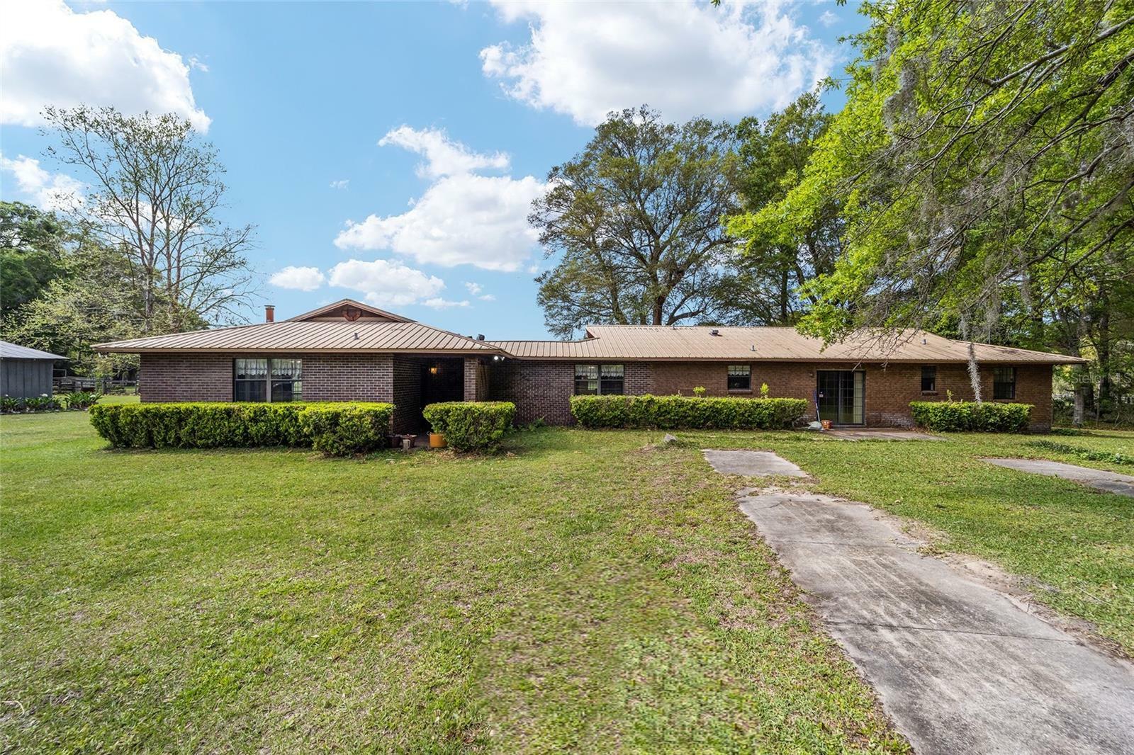 Property Photo: 10015 NW County Road 235 FL 32615