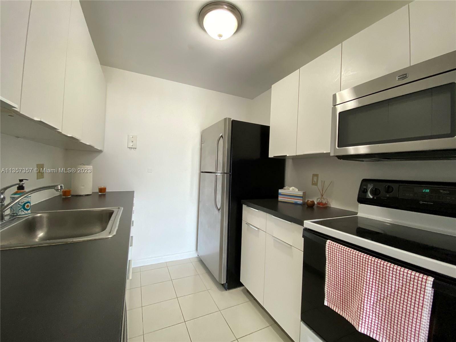 Property Photo:  2020 NE 135th St 202  FL 33181 