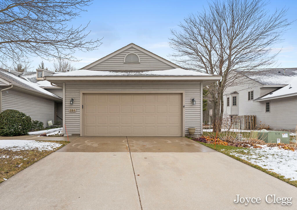 Property Photo:  594 Tournament Circle  MI 49444 