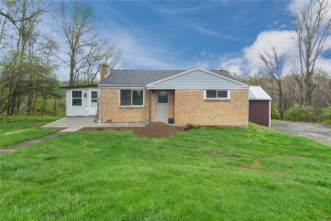 Property Photo:  2026 Ridge Road Ext  PA 15003 