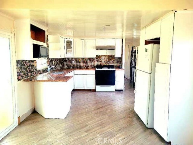 Property Photo: 7721 Mission Blvd 9 CA 92509