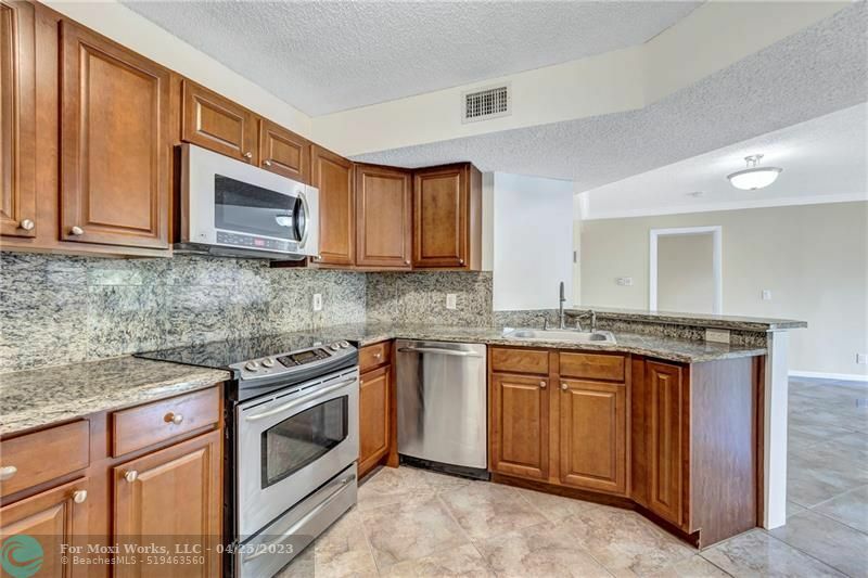 8901 Wiles Rd 204  Coral Springs FL 33067 photo