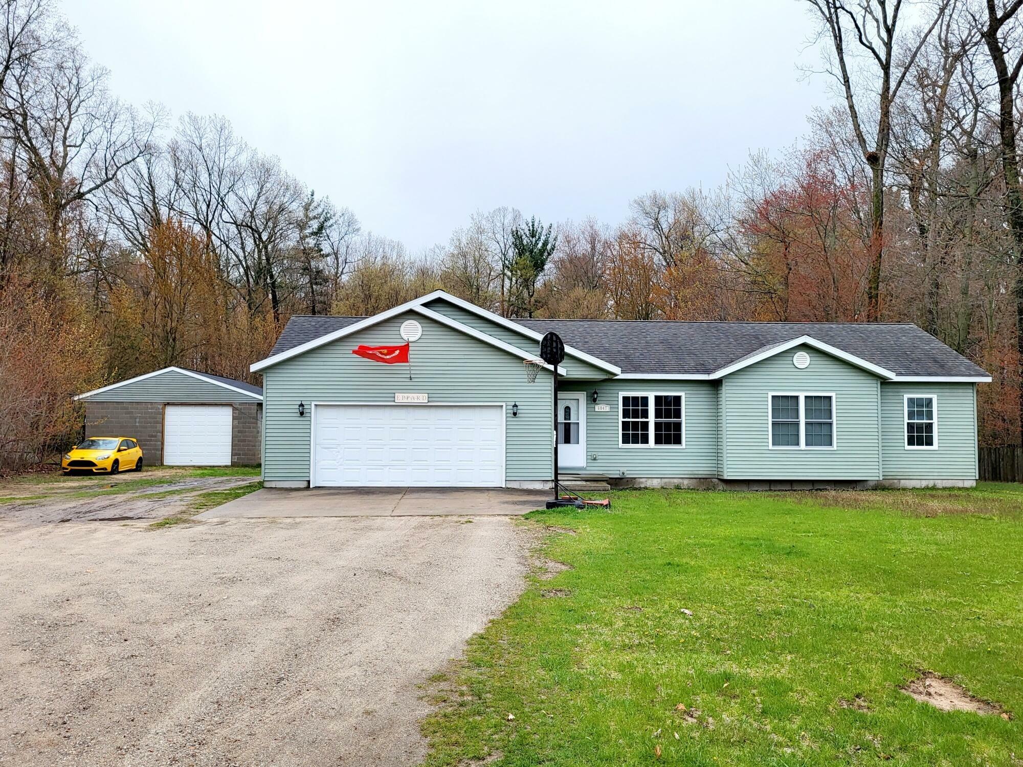 Property Photo:  6847 Post Road  MI 49437 