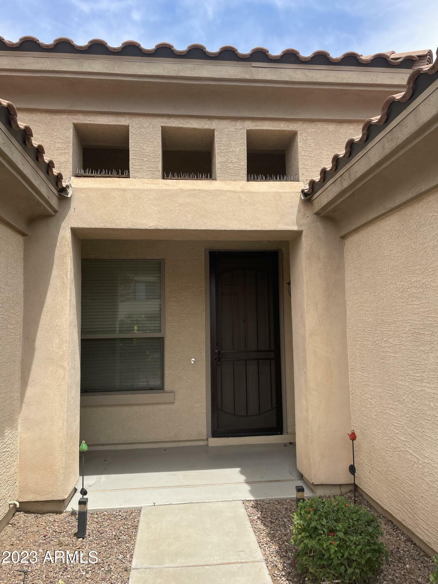 Property Photo: 8832 W Midway Avenue AZ 85305