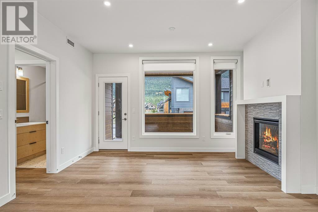 Property Photo: 209 Stewart Creek Rise AB T1W0N9
