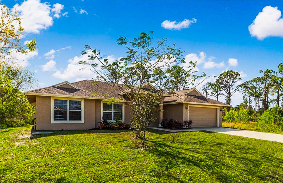 Property Photo:  1246 SW Santiago Avenue  FL 34953 