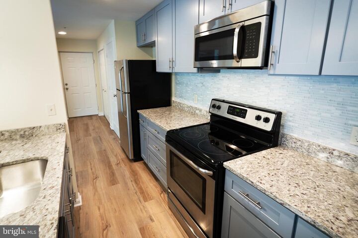 Property Photo: 9804 Lake Pointe Court 202 MD 20774