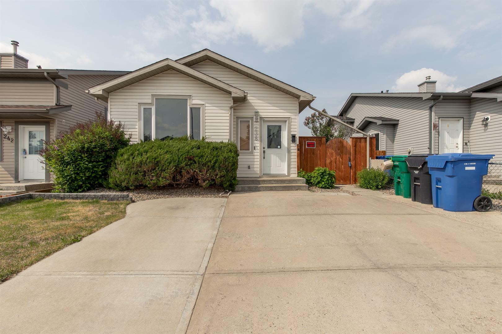 Property Photo: 238 Heritage Court W AB T1K 7Y5