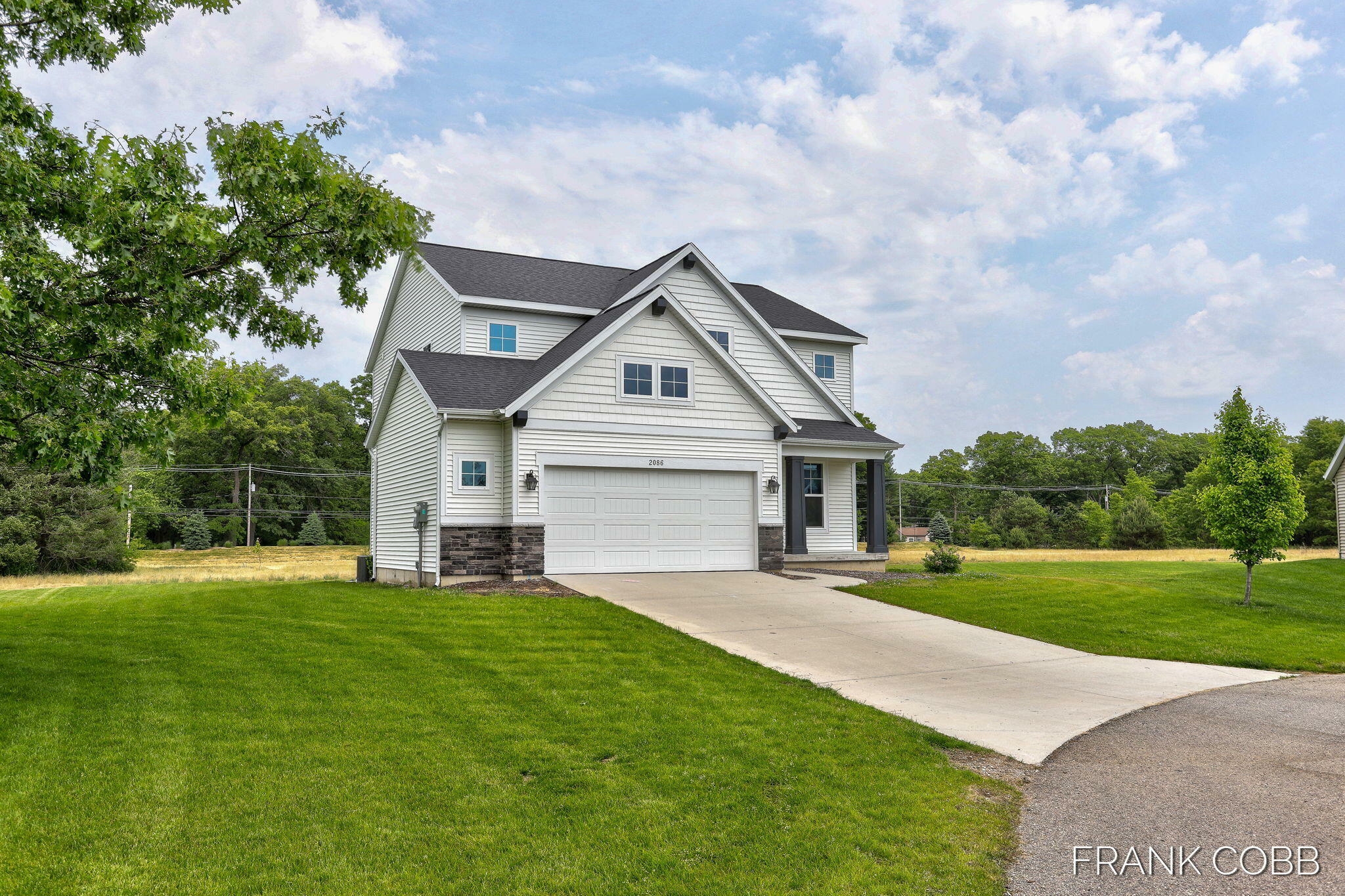 Property Photo:  2086 Poplar Court  MI 49445 