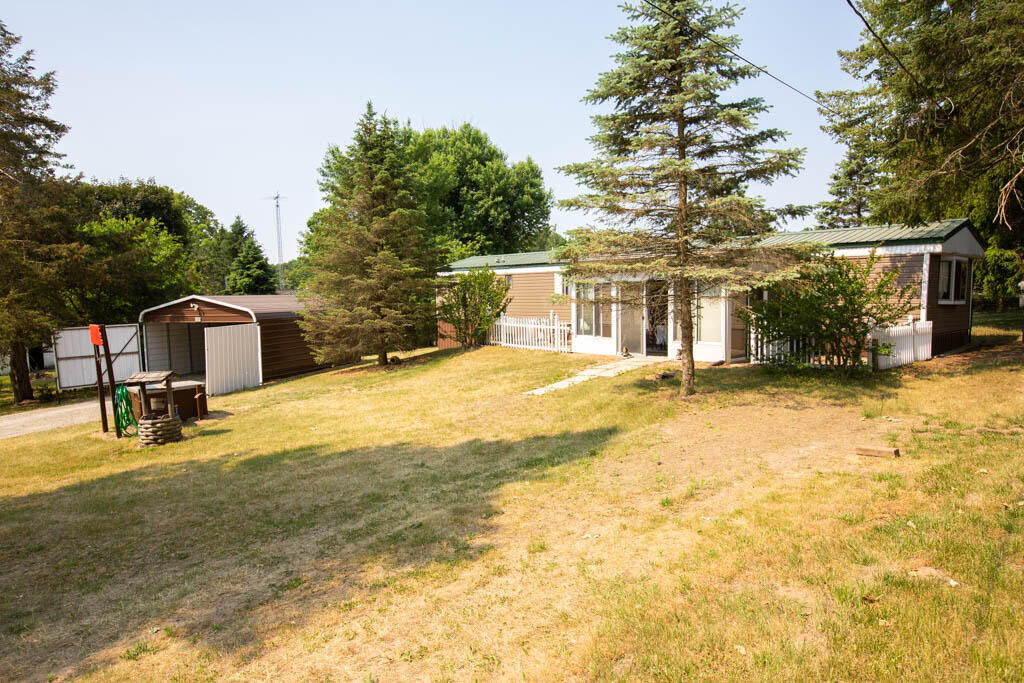 Property Photo:  8164 Topinabee Drive  MI 49255 