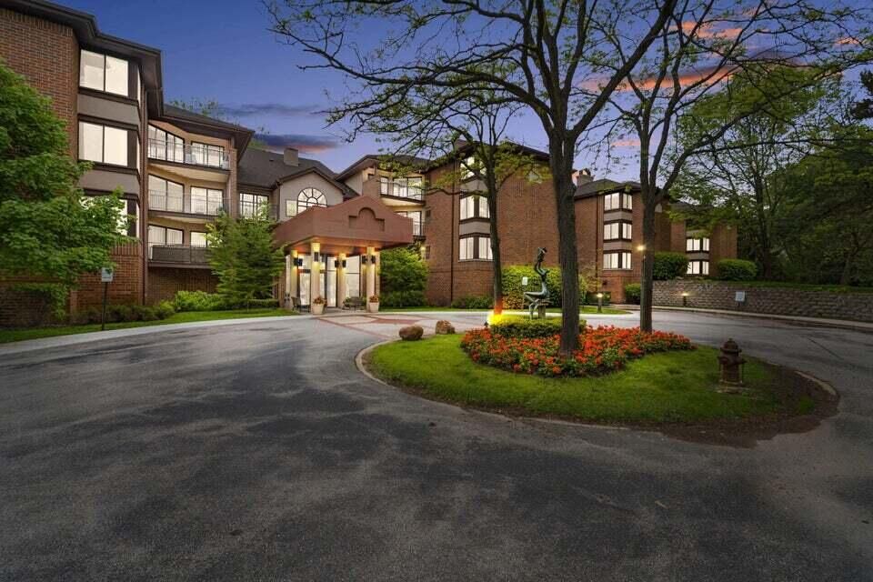 Property Photo:  1600 W Green Tree Rd 205  WI 53209 