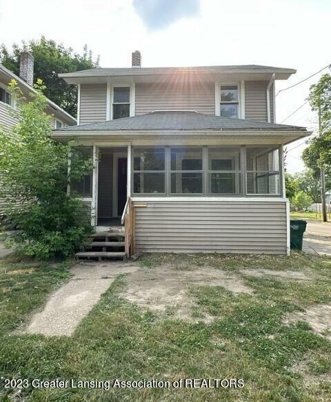 Property Photo:  1415 N High Street  MI 48906 