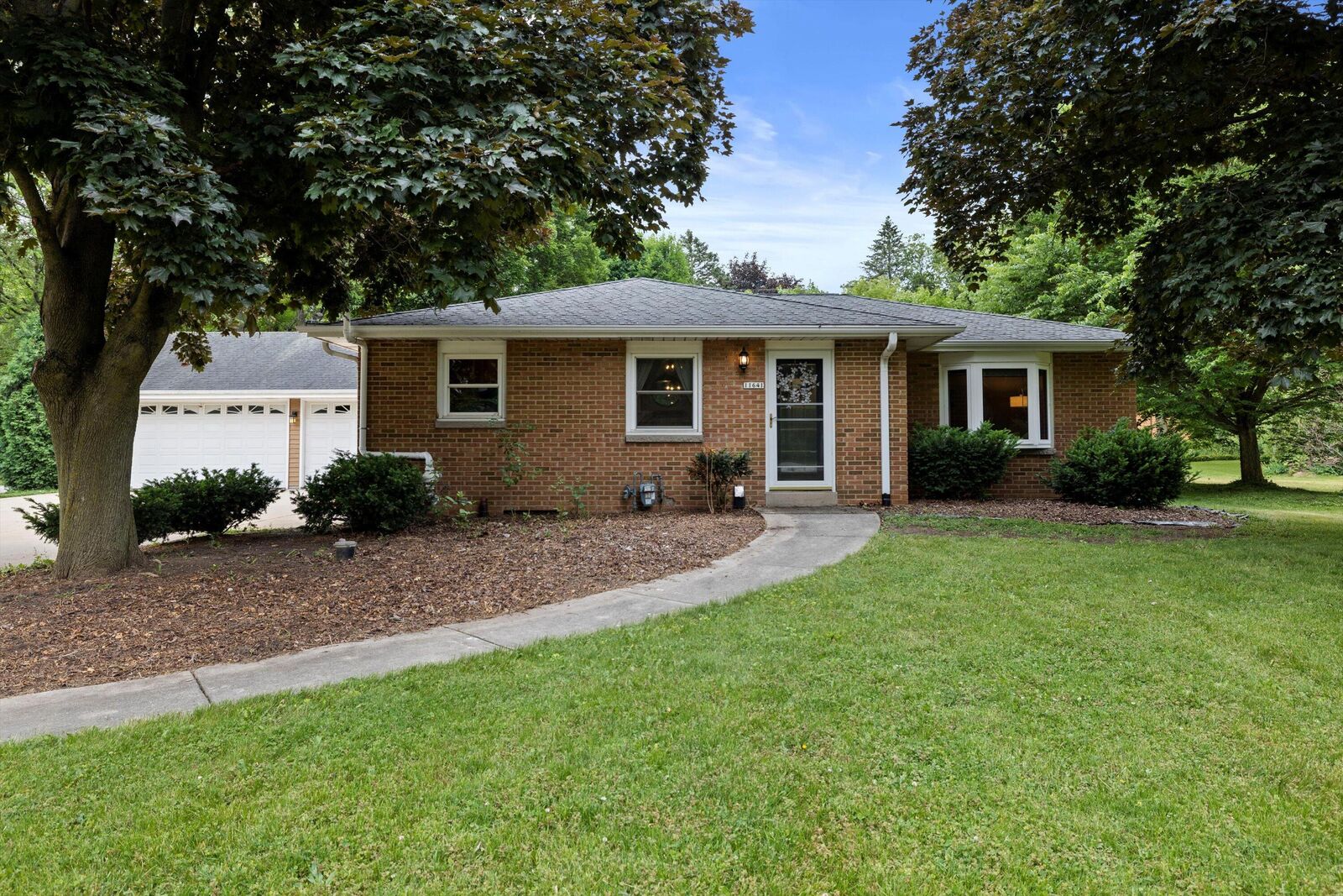 Property Photo:  11641 W Rawson Ave  WI 53132 