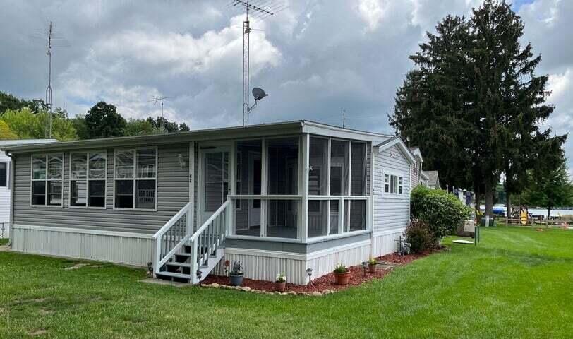 Property Photo:  W5229 Surfwood Dr 47  WI 53121 