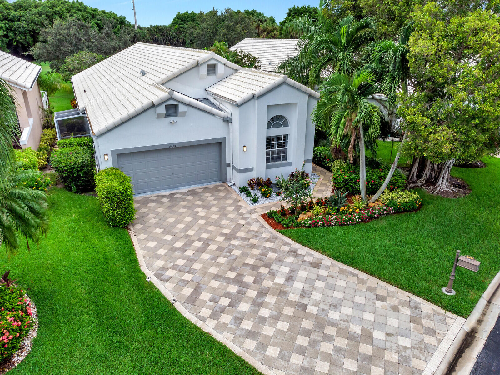 Property Photo:  6447 Three Lakes Lane  FL 33437 