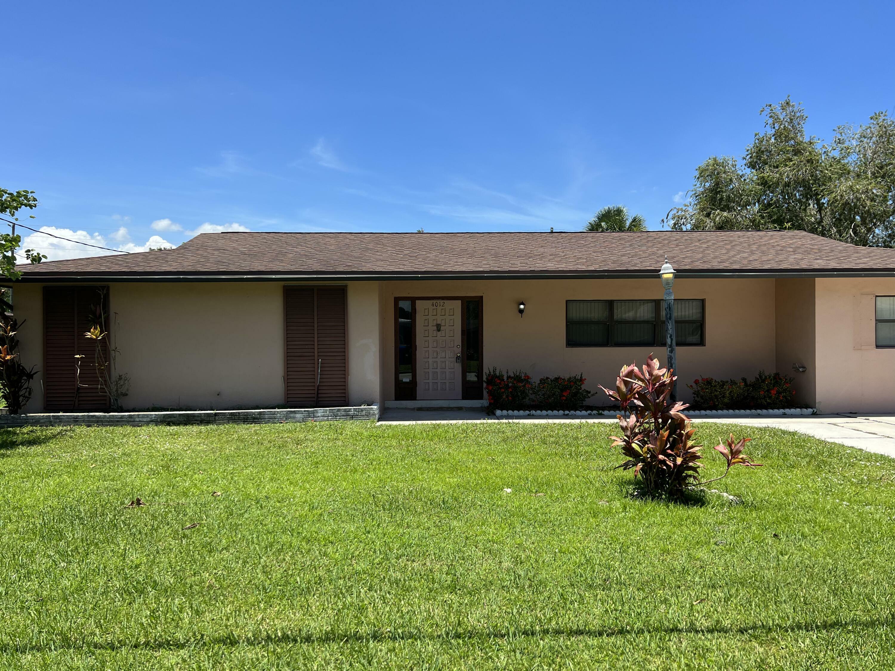 Property Photo:  4012 Greenwood Drive  FL 34982 