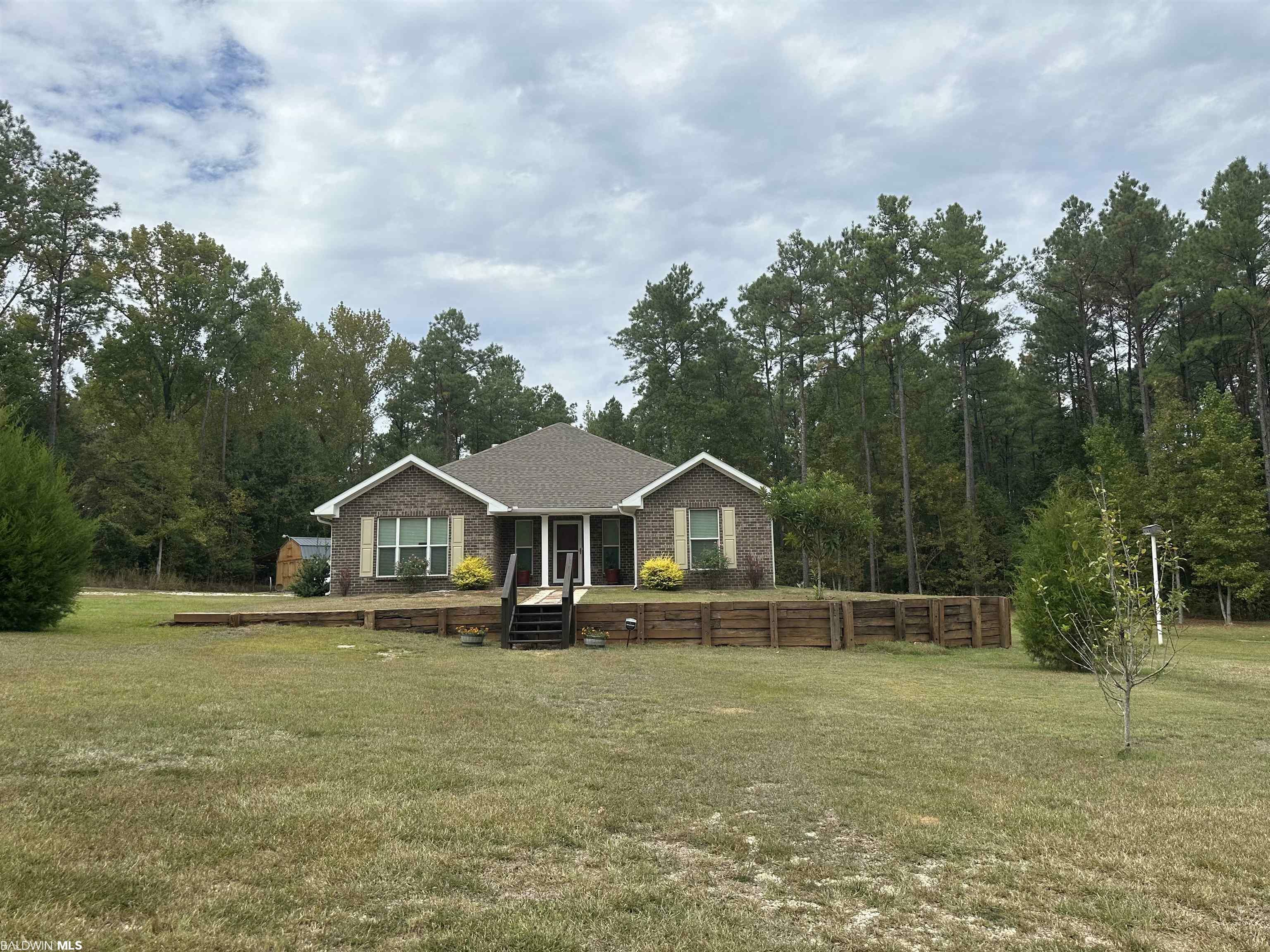 Property Photo:  33451 County Road 64 Extension  AL 36567 