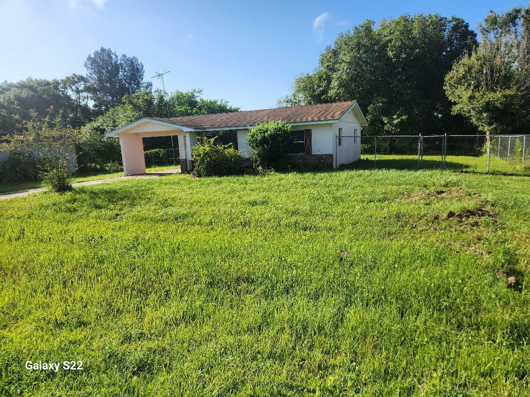 Property Photo:  915 NW 9th Street  FL 34972 