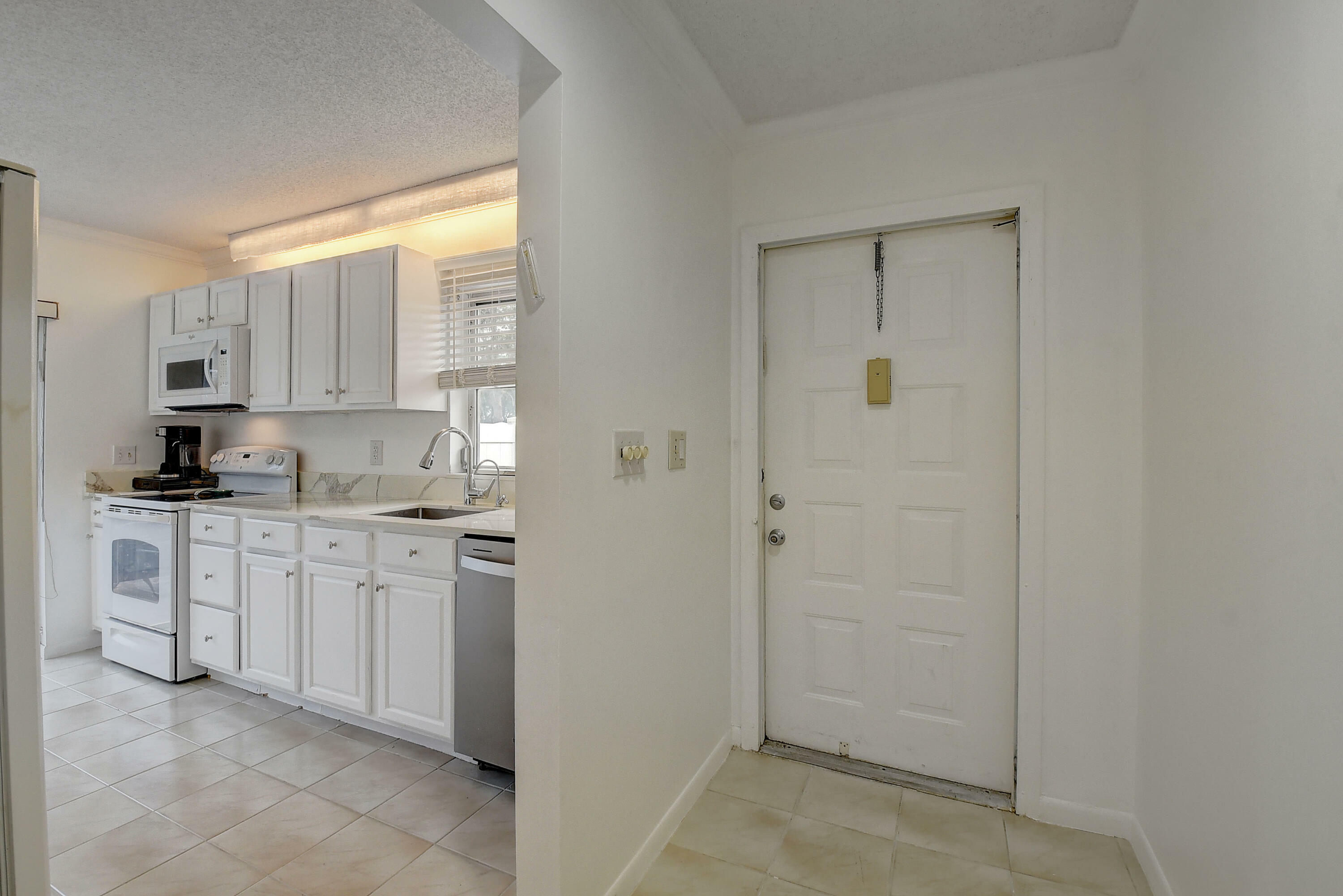 Property Photo: 8733 Windrow Way B FL 33496