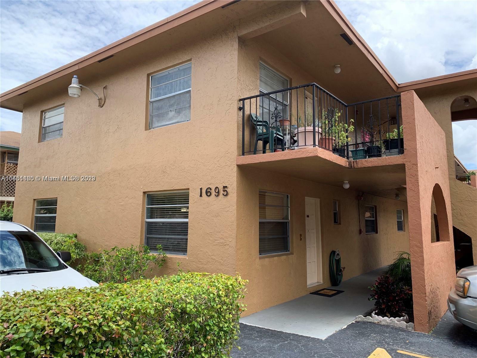 Property Photo:  1695 W 42nd St 201  FL 33012 