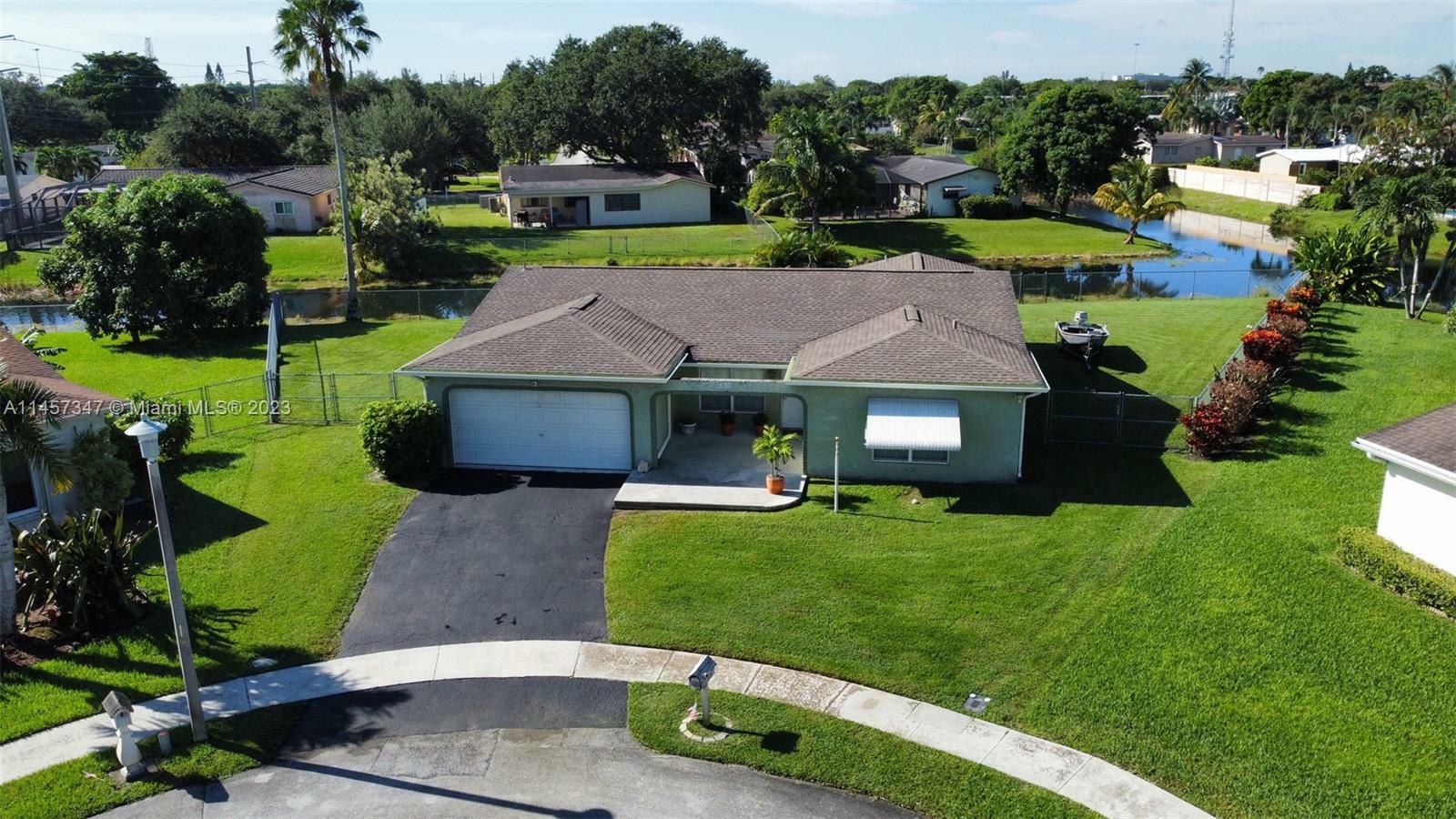 Property Photo: 530 NW 92nd Ave FL 33024
