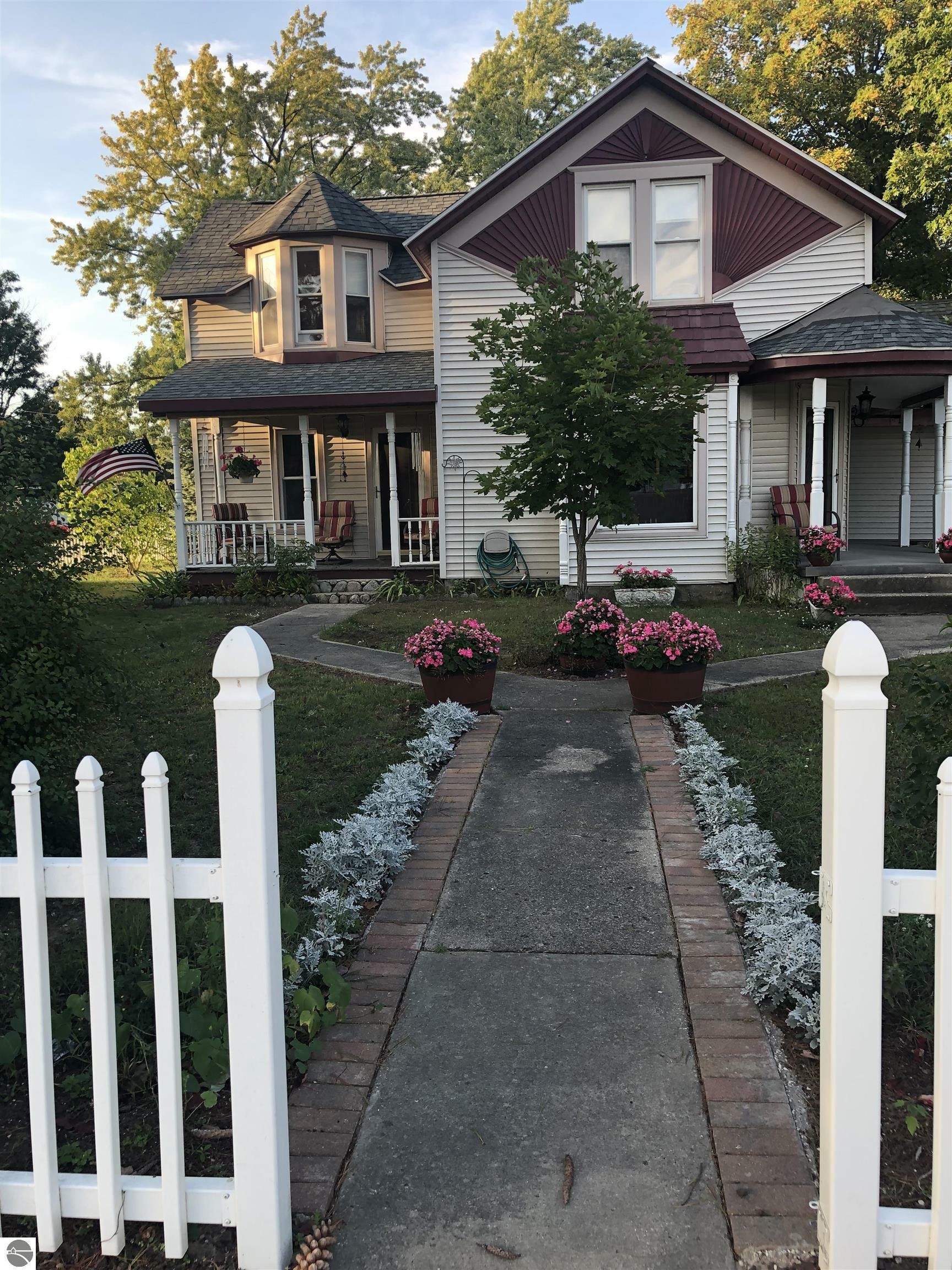 Property Photo:  114 W Dresden Street  MI 49646 