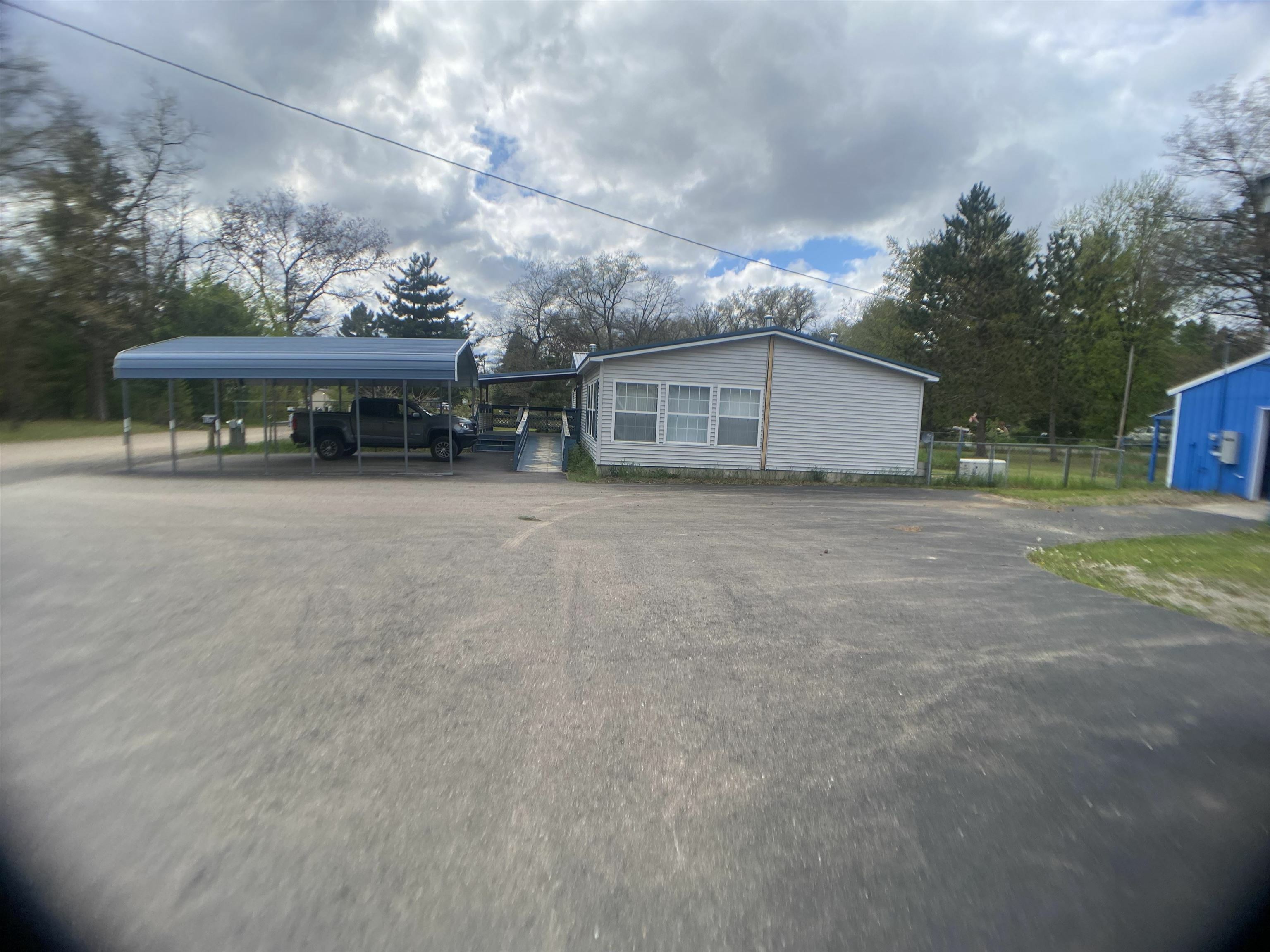 Property Photo:  1575 Northwoods  MI 48610 