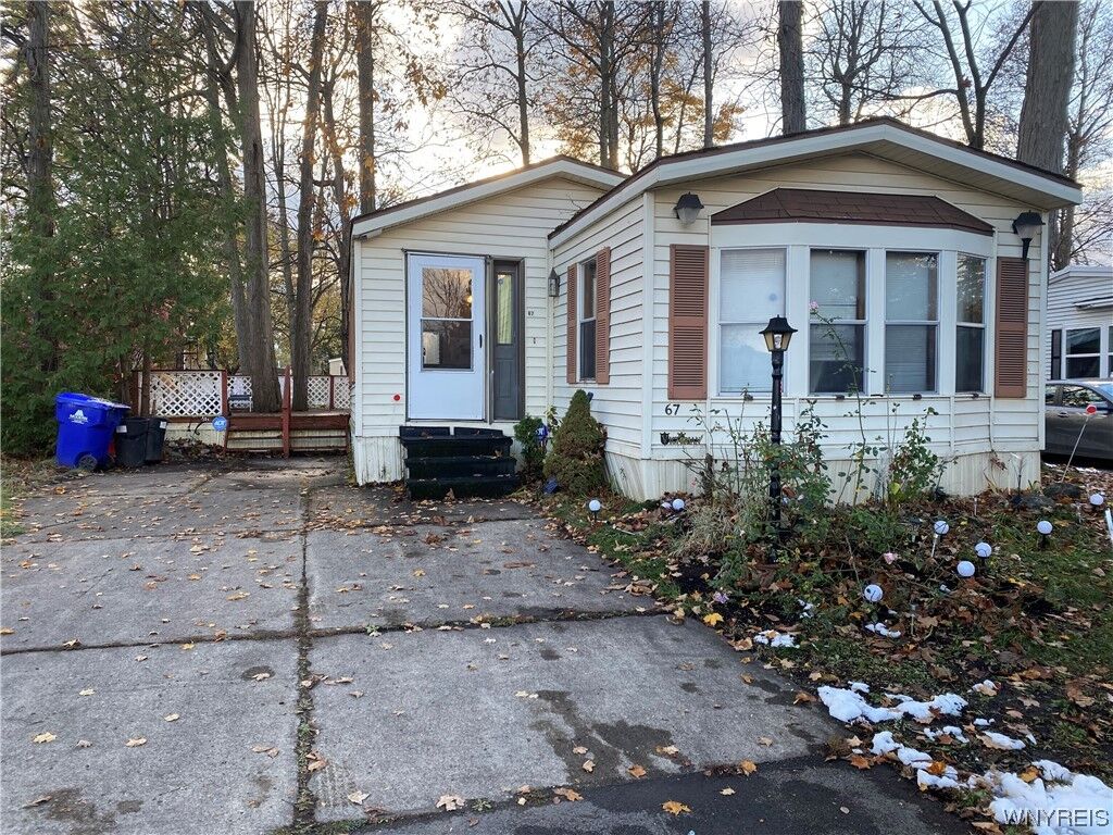 Property Photo: 67 S Whispering Lane NY 14075
