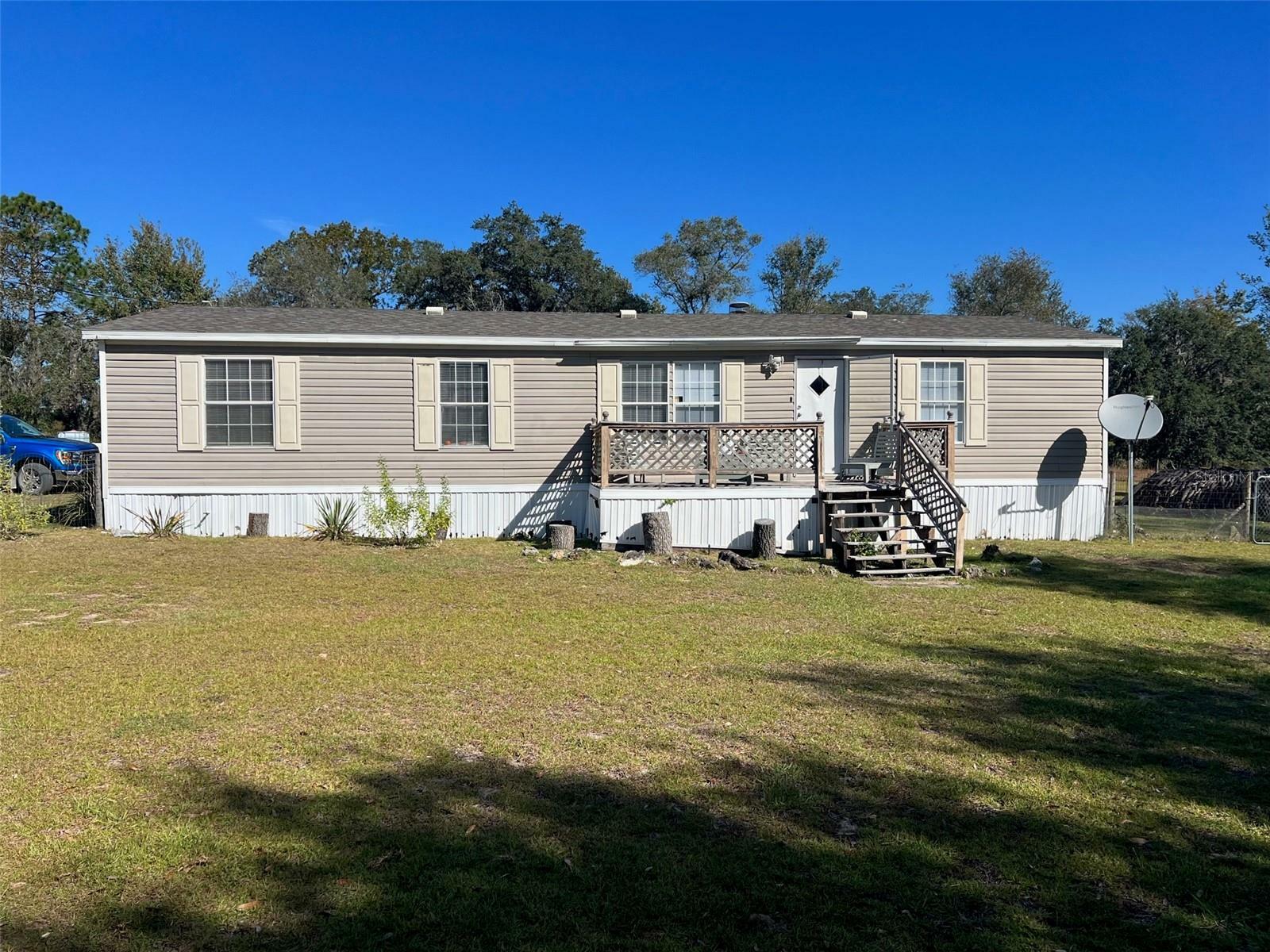 Property Photo:  12531 NE 18th Street  FL 32696 