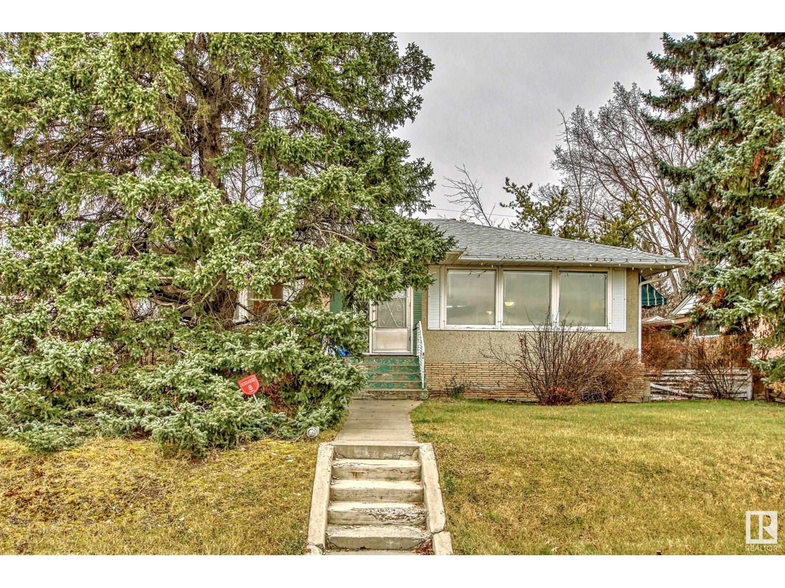 Property Photo:  8731 Strathearn Cr NW  AB T6C4C5 
