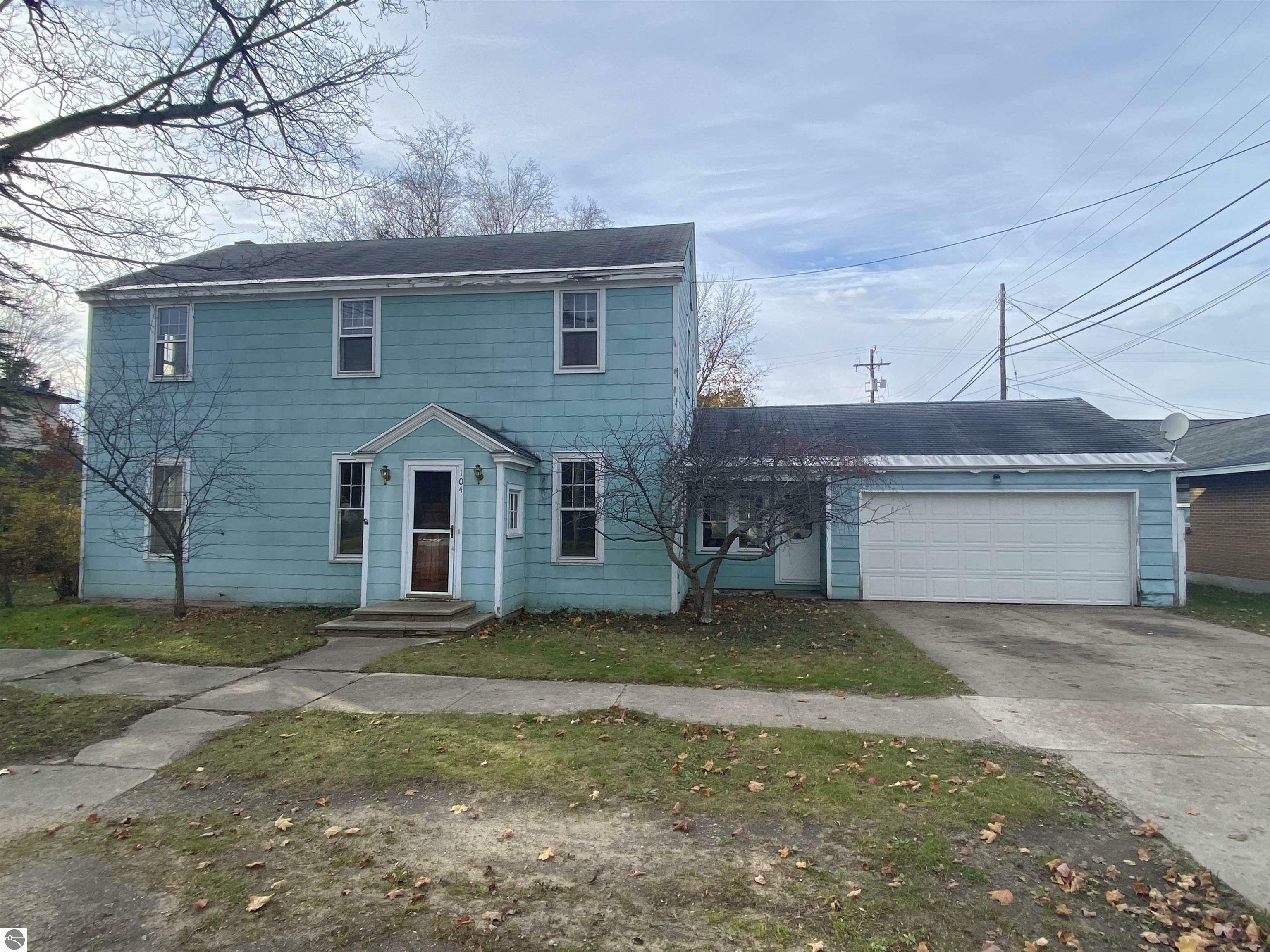 Property Photo:  104 Court Street  MI 49615 