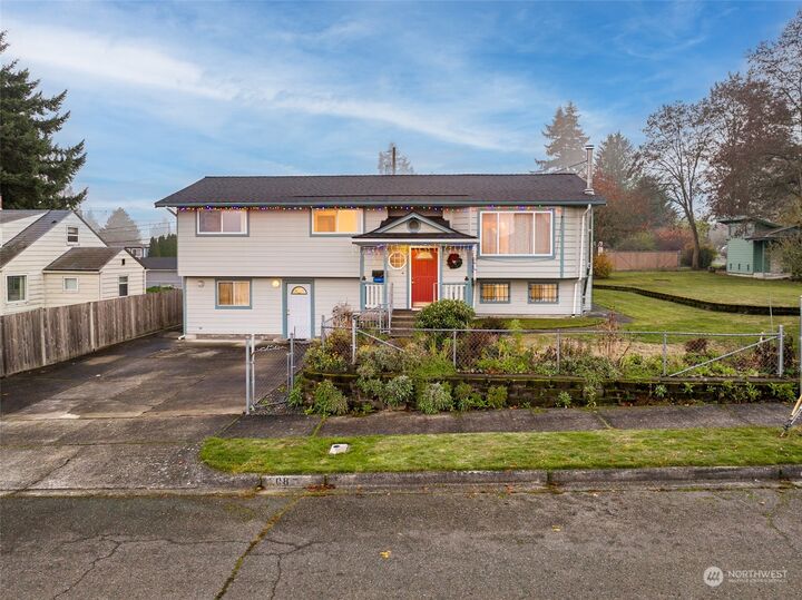 Property Photo:  208 E 62nd Street  WA 98404 