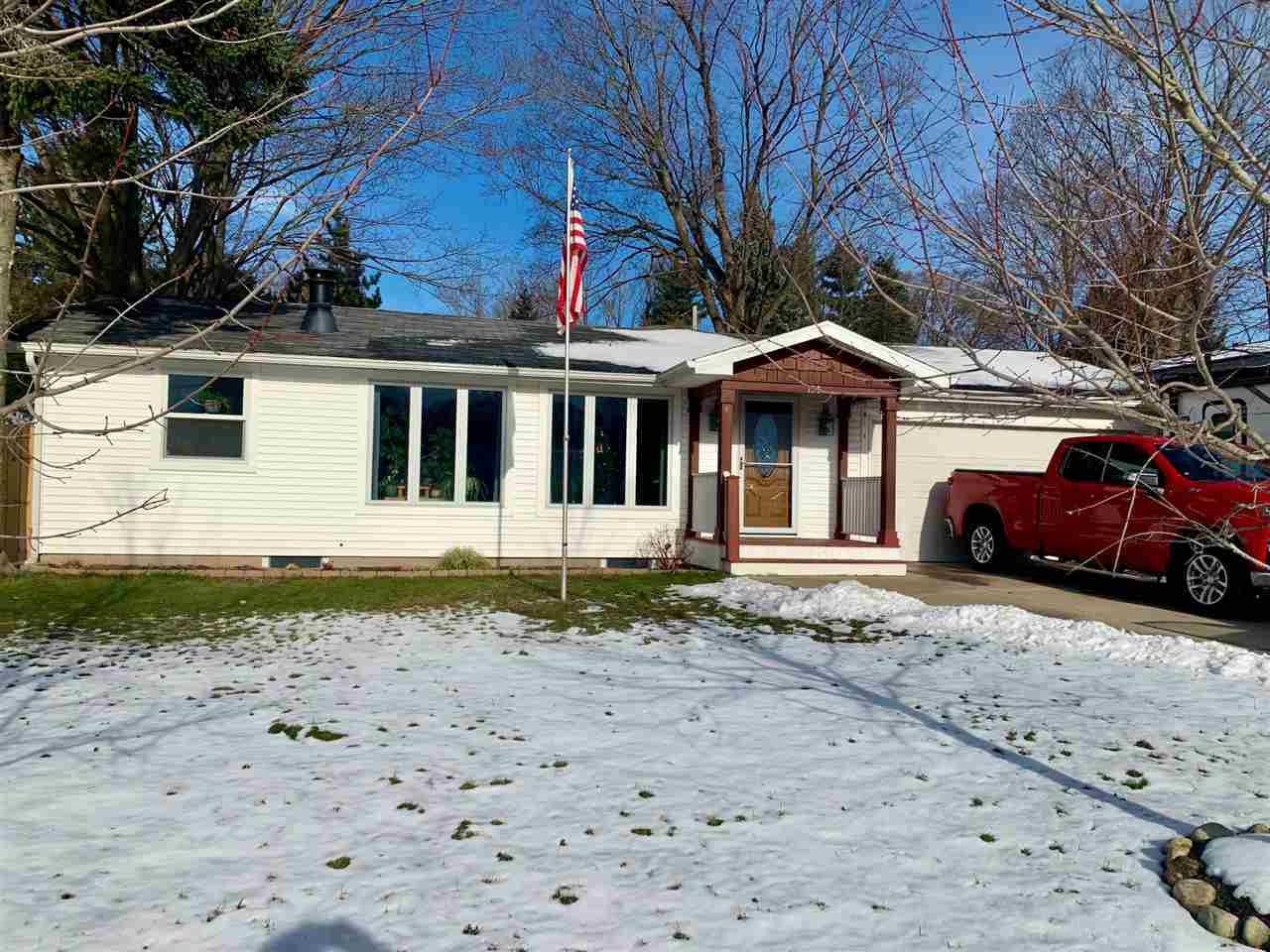 Property Photo:  134 Silver St  MI 49712 