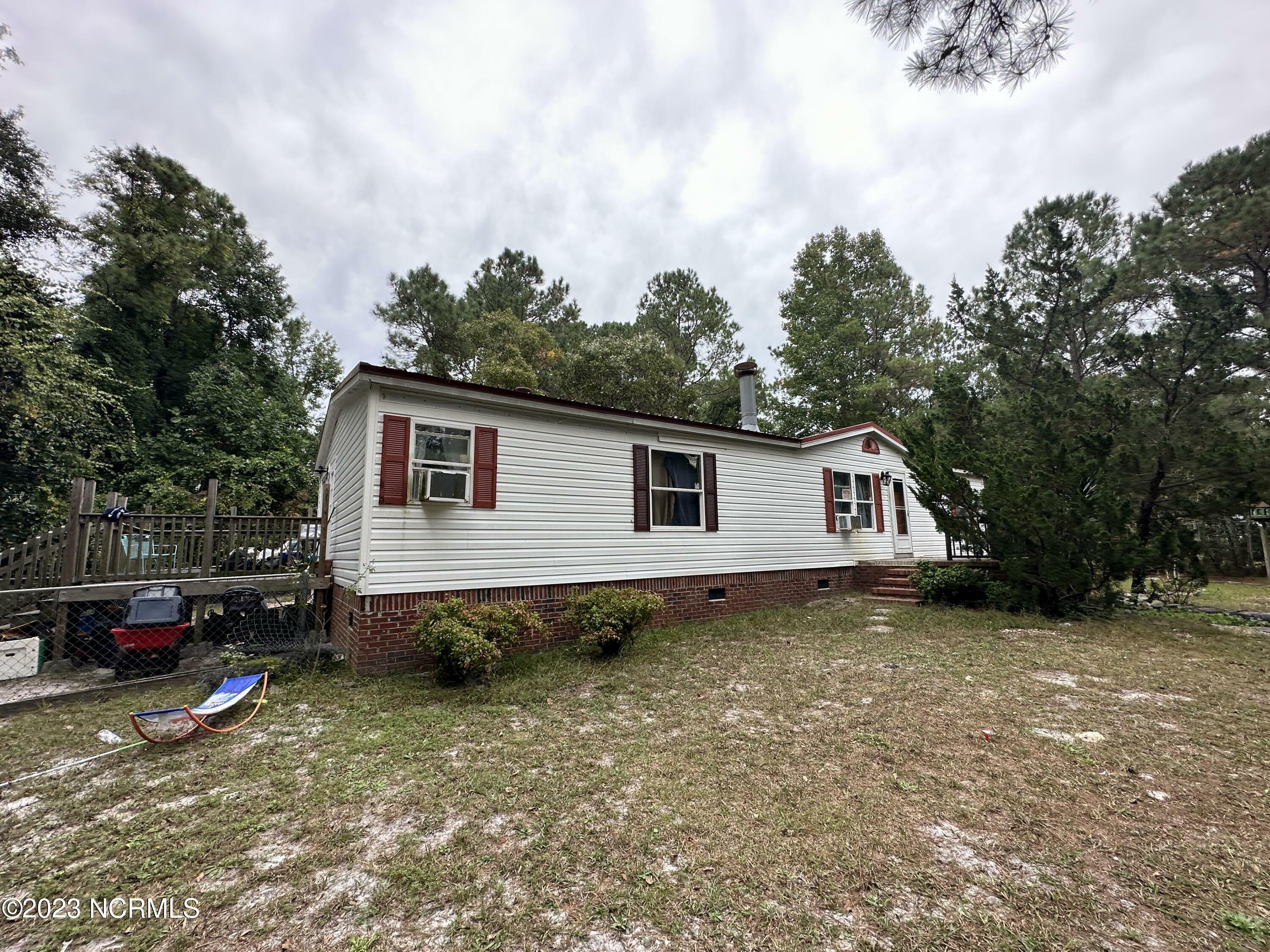 Property Photo:  222 Dragonfly Court  NC 28539 