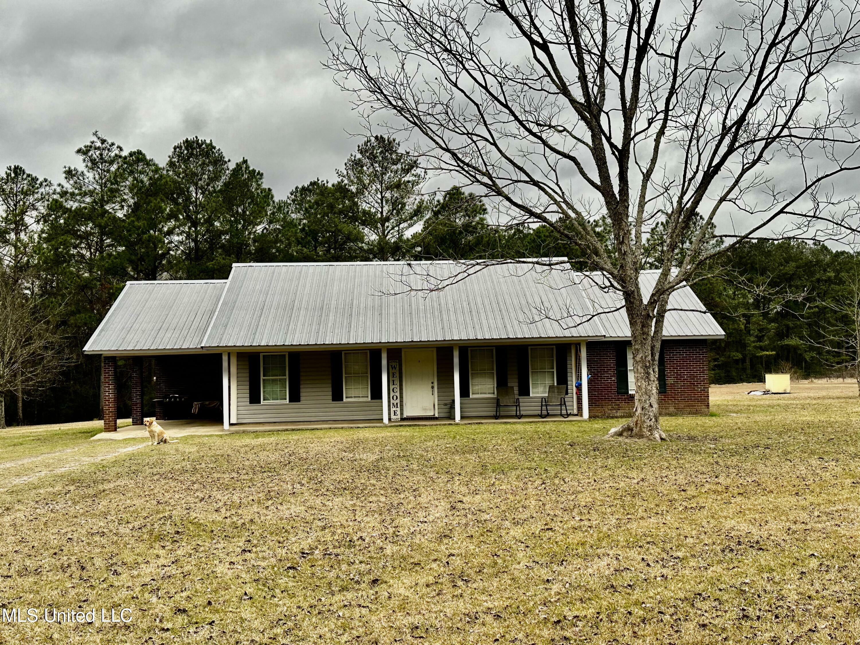 Property Photo:  26401 Dennis Nelson Road  MS 39452 