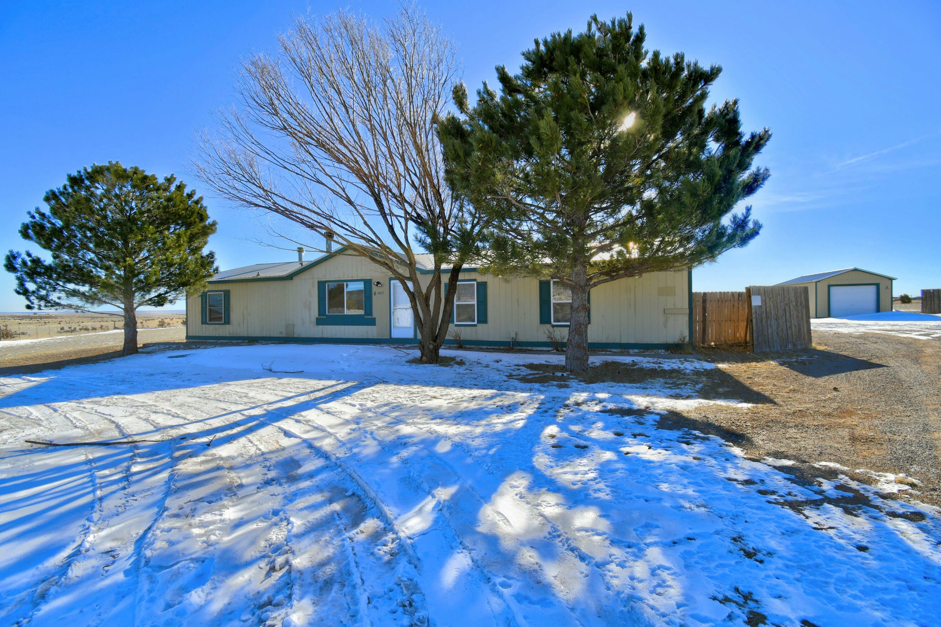 Property Photo:  6 East Falcon Court  NM 87015 