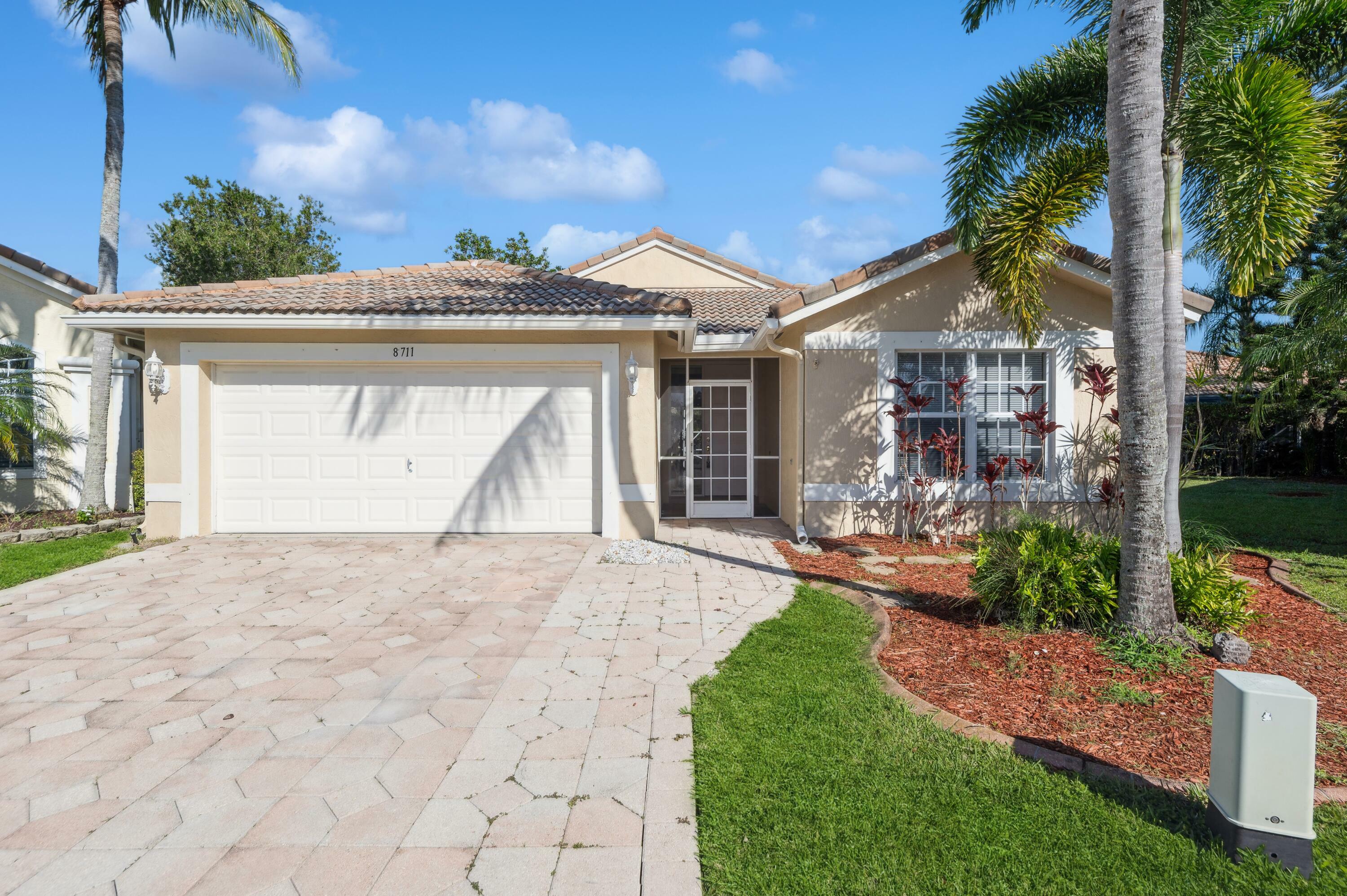Property Photo: 8711 Treasure Cay FL 33411