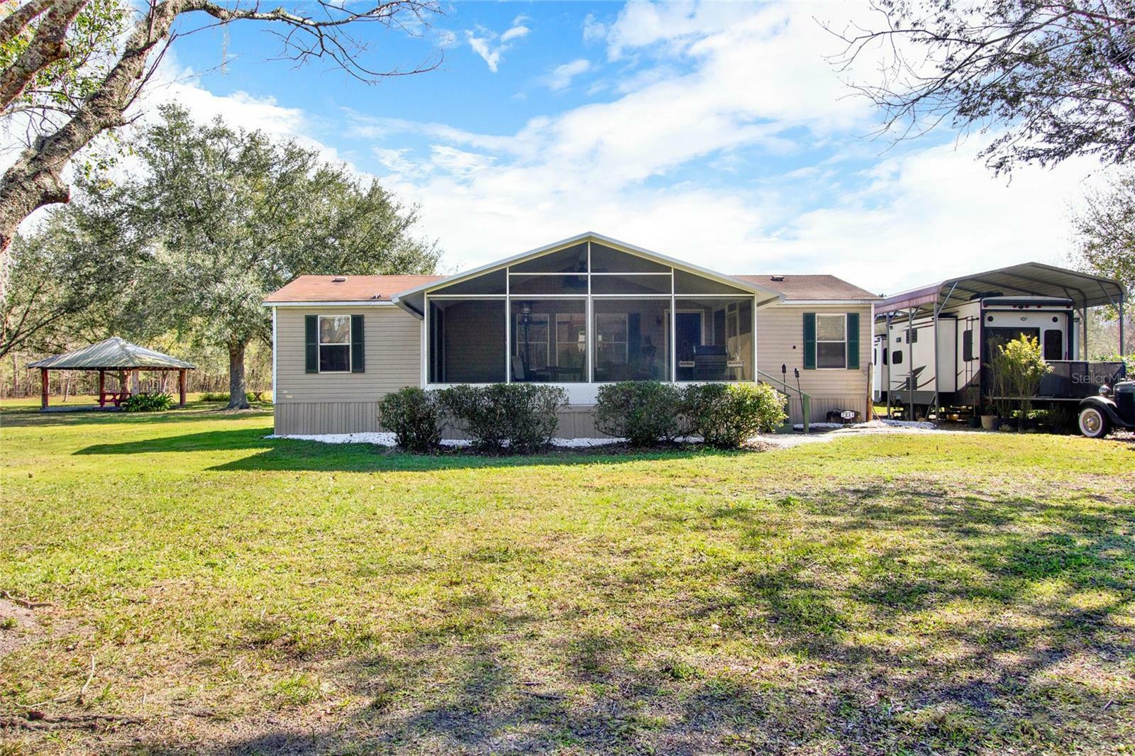 Property Photo:  7944 Bay Lake Road  FL 34736 